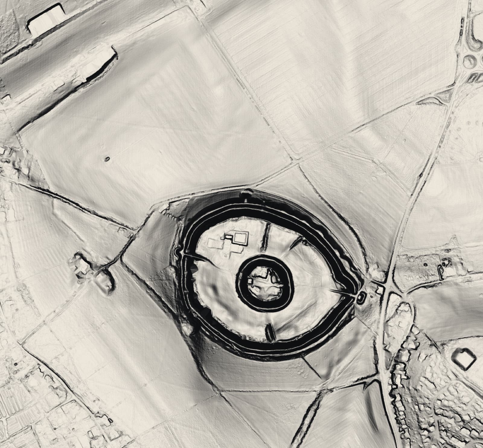 Lidar hillshade of Old Sarum, Wiltshire: concentric ramparts around an inner motte, with cathedral foundations visible inside the enclosure
