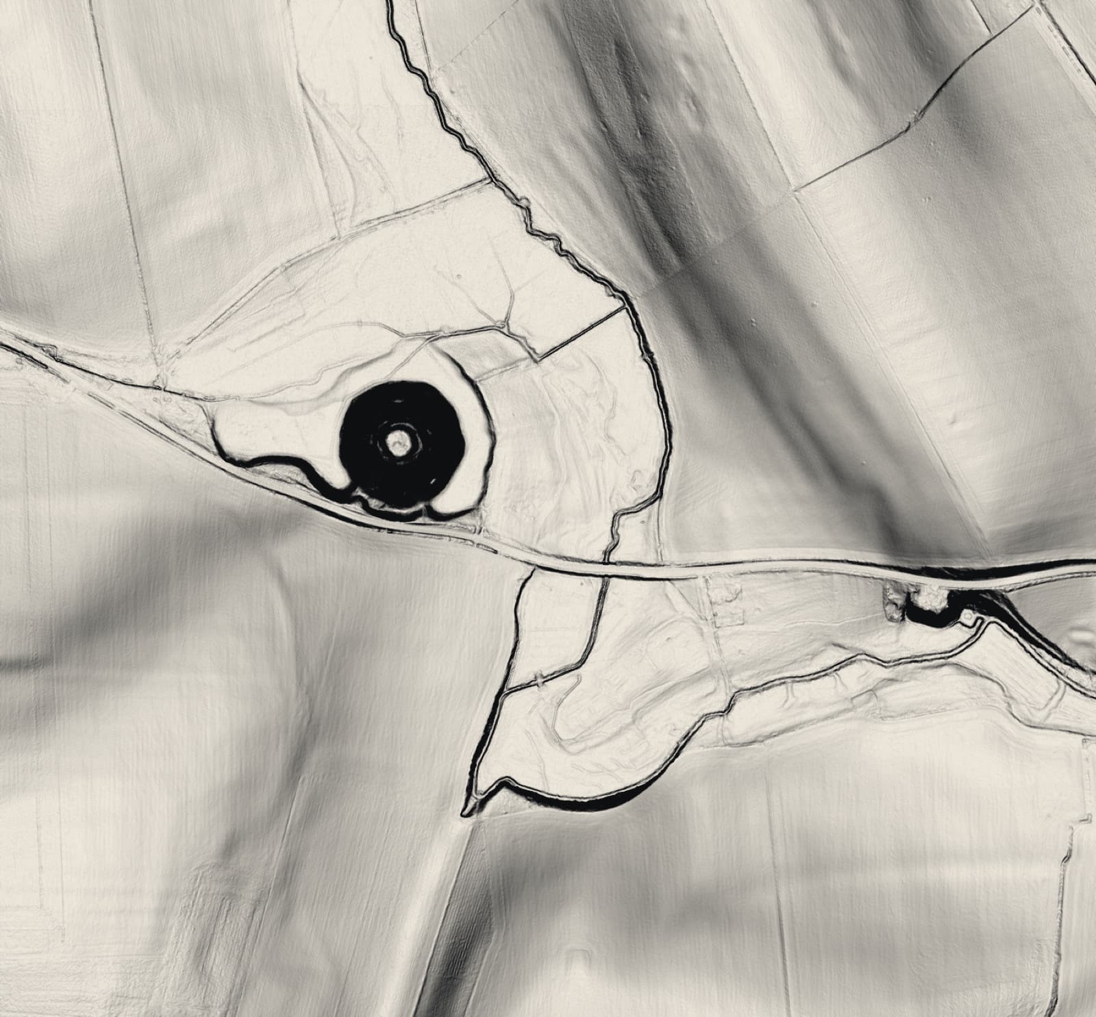 Lidar hillshade of Silbury Hill, Wiltshire: a large conical prehistoric mound with the surrounding ditch and field system